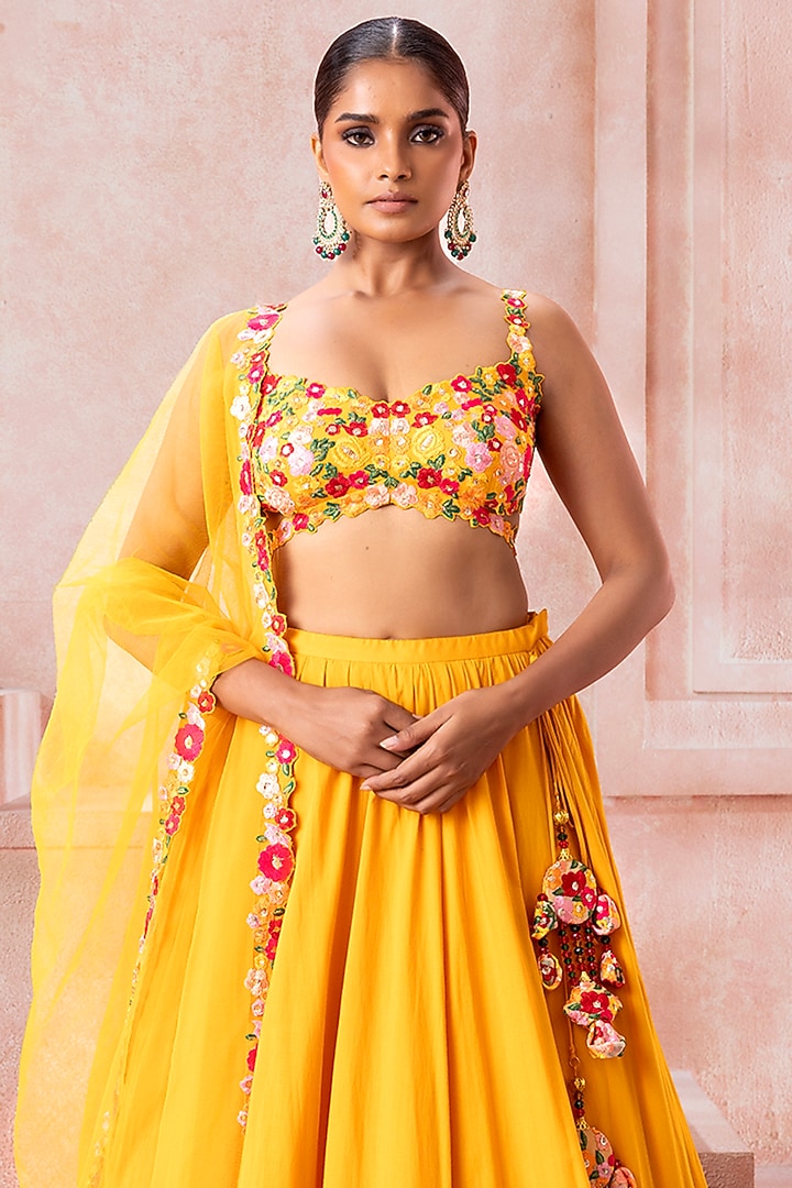 Amber Yellow Swiss Cotton Floral Motif Embroidered Bridal Lehenga Set by Neeta Lulla at Pernia's Pop Up Shop