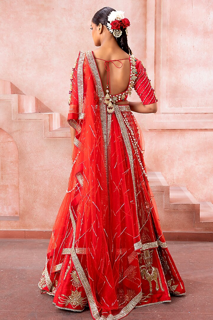 Deep Red Tulle Peal & Stone Embroidered Bridal Lehenga Set by Neeta Lulla at Pernia's Pop Up Shop