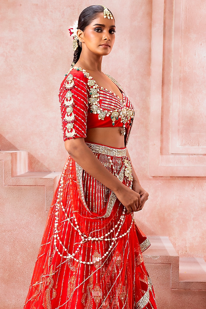 Deep Red Tulle Peal & Stone Embroidered Bridal Lehenga Set by Neeta Lulla at Pernia's Pop Up Shop