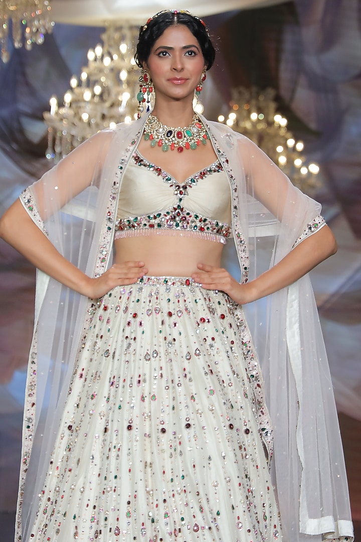 Ivory Tulle Sequins & Stone Embroidered Bridal Lehenga Set by Neeta Lulla at Pernia's Pop Up Shop