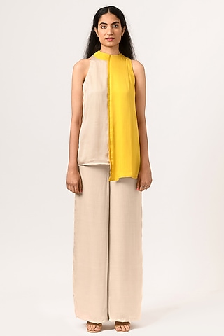 Ecru & Yellow Halter-Neck Blouse by Neora by Nehal Chopra