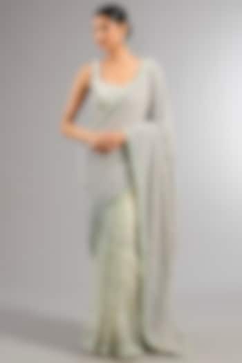 Powder Blue Georgette Sequins & Cutdana Embellished Reception Saree Set by COUTURE BY NIHARIKA at Pernia's Pop Up Shop