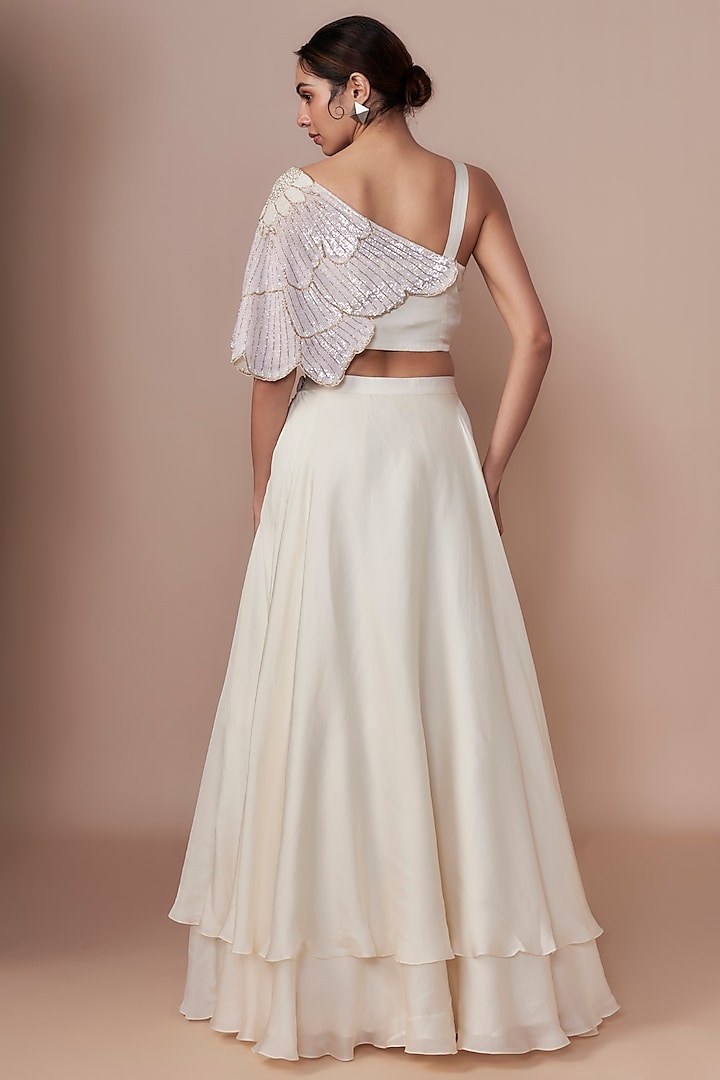 Ivory Satin Organza & Crepe A-Line Layered Wedding Lehenga Set by COUTURE BY NIHARIKA at Pernia's Pop Up Shop