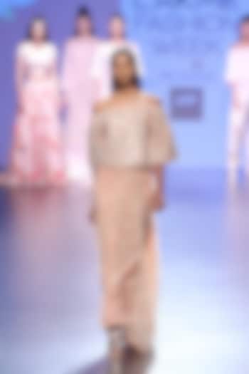 Pink sequins embroidered saree and off shoulder crop top with petticoat and potli bag available only at Pernia's Pop Up Shop.