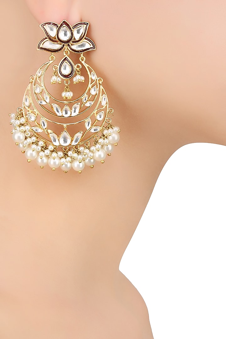 Gold Finish Kundan Stones and Pearls Crescent Shaped Earrings by Nepra By Neha Goel