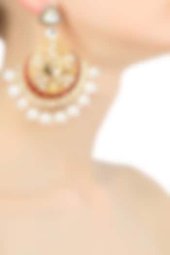 Gold plated red flying swan kundan and pearls earrings by Nepra By Neha Goel