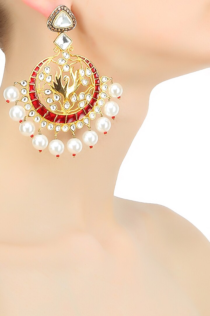 Gold plated red flying swan kundan and pearls earrings by Nepra By Neha Goel