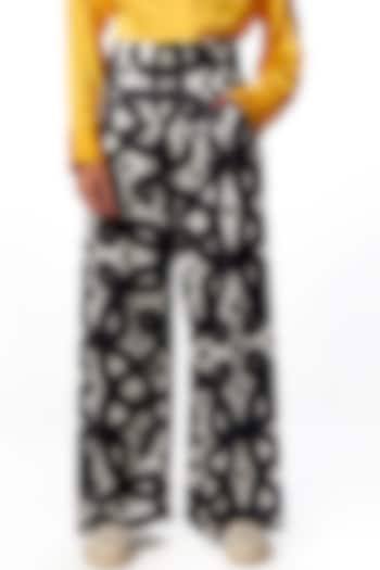 Black Silk Printed High-Waisted Trousers by No Grey Area at Pernia's Pop Up Shop