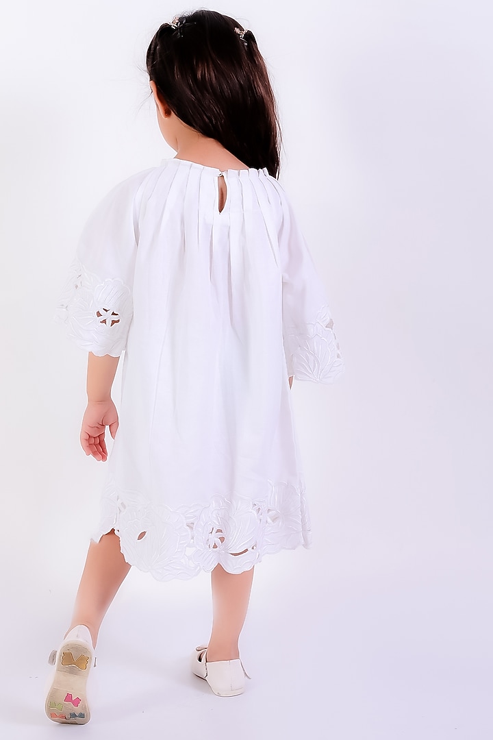 Ivory Cotton Linen Thread Embroidered Pleated Dress For Girls by Neha Gursahani Kids at Pernia's Pop Up Shop