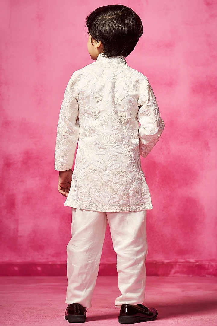 Ivory Satin Linen Thread Embroidered Asymmetric Kurta Set For Boys by Neha Gursahani Kids at Pernia's Pop Up Shop