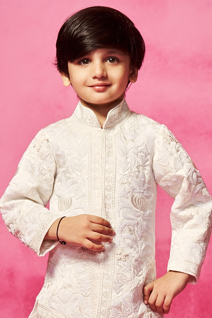 Ivory Satin Linen Thread Embroidered Asymmetric Kurta Set For Boys by Neha Gursahani Kids at Pernia's Pop Up Shop