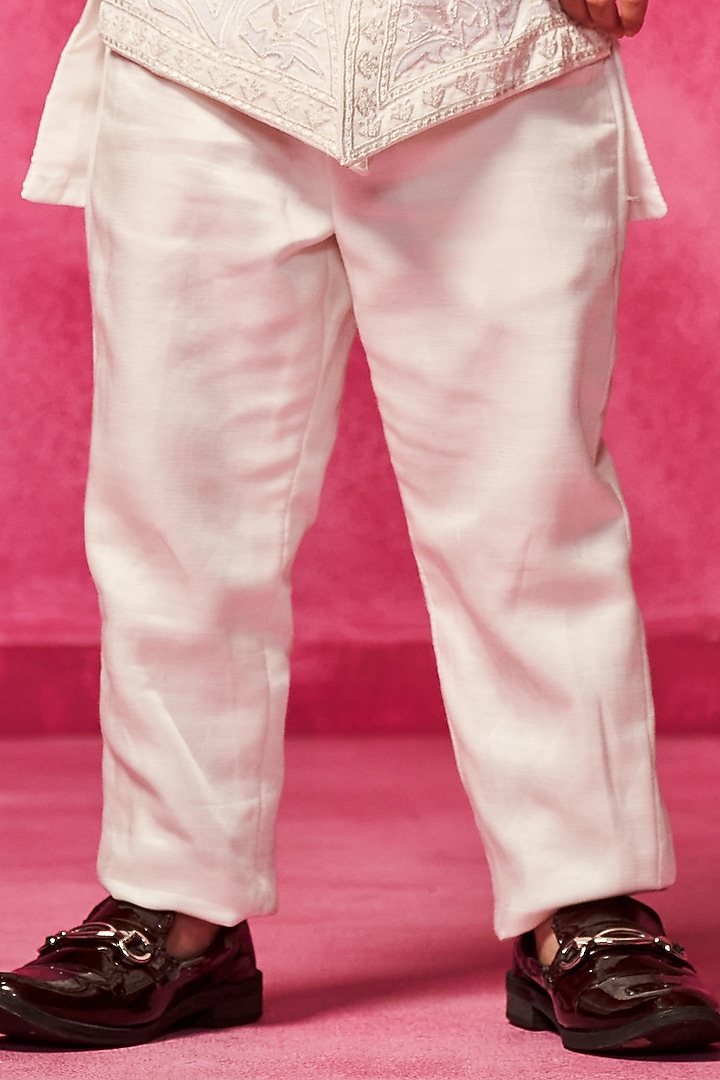 Ivory Satin Linen Thread Embroidered Asymmetric Kurta Set For Boys by Neha Gursahani Kids at Pernia's Pop Up Shop