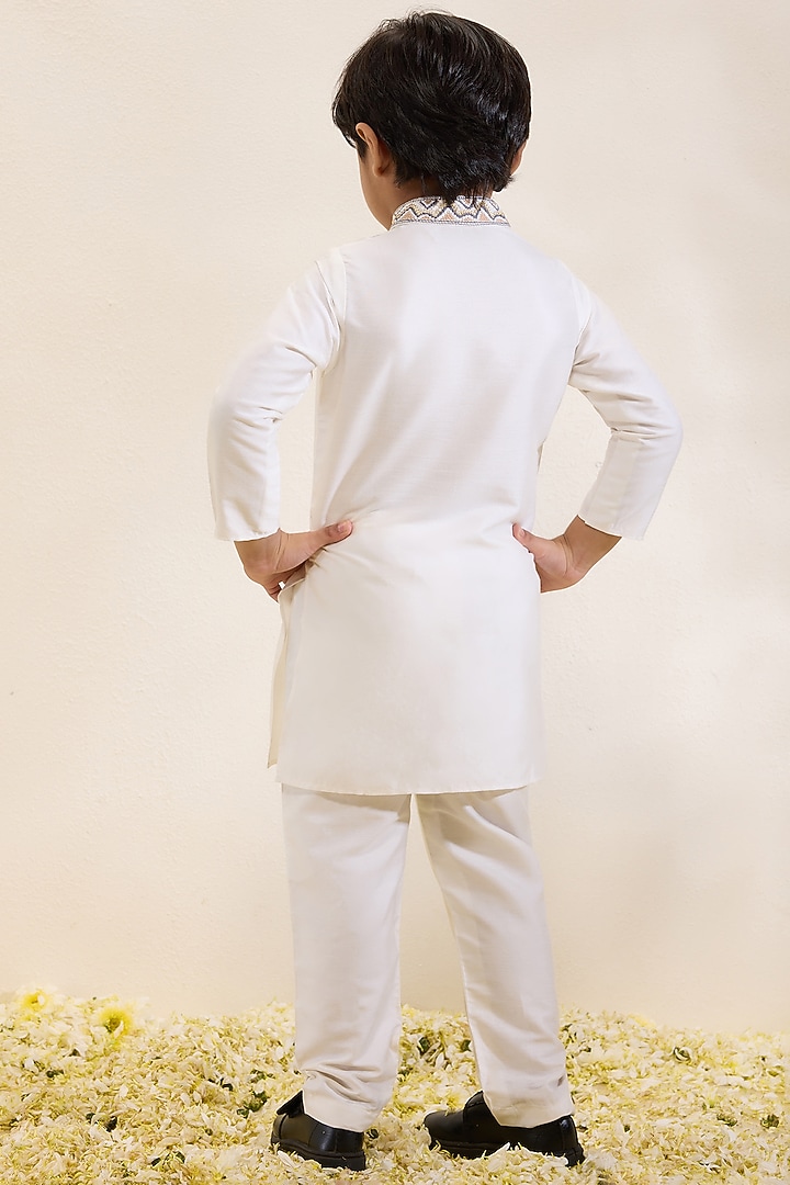 Ivory Spun Silk Embroidered Kurta Set For Boys by Neha Gursahani Kids at Pernia's Pop Up Shop