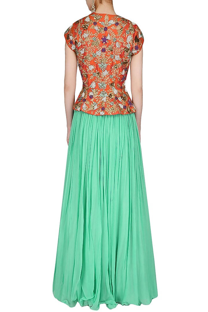 Coral jaal embroidered peplum top with sea green pleated skirt available only at Pernia's Pop Up Shop.