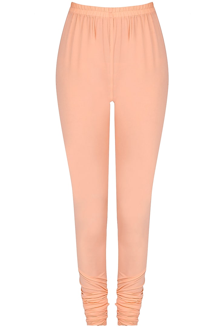 Powder pink embroidered floor length suit with blush pink churidaar pants available only at Pernia's Pop Up Shop.