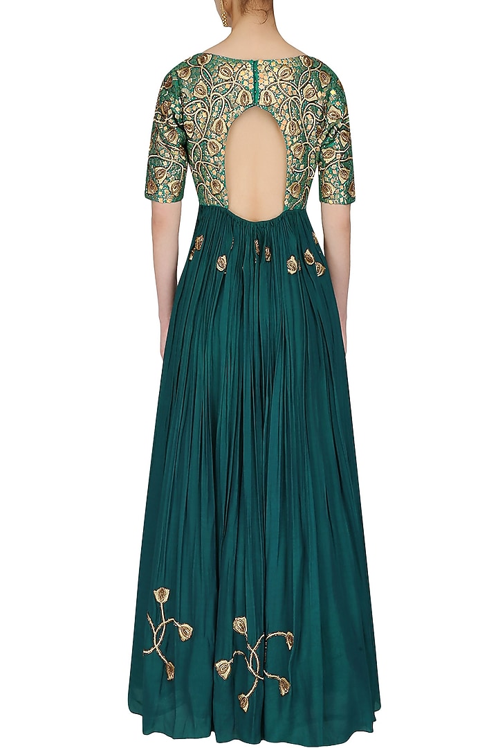 Bottle green embroidered floor length suit with green churidaar pants available only at Pernia's Pop Up Shop.