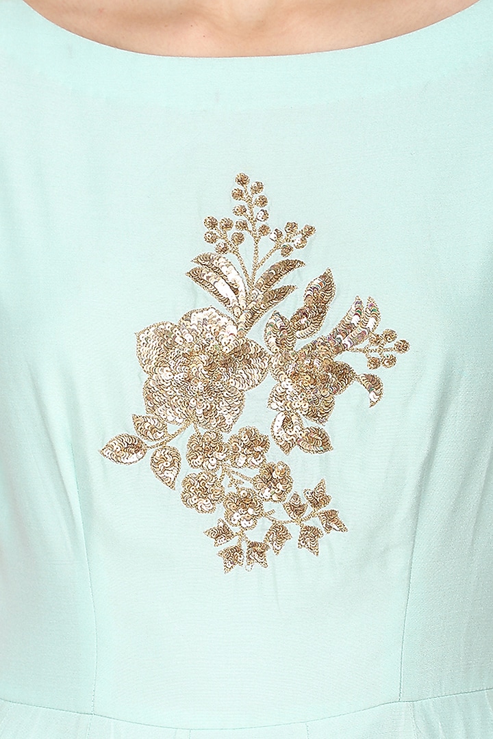 Mint green embroidered peplum kurta with ivory dhoti pants set available only at Pernia's Pop Up Shop.