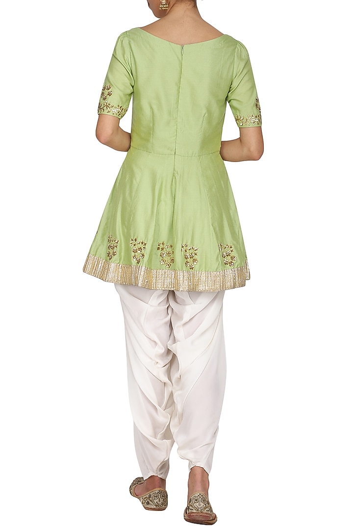 Olive green embroidered peplum kurta with ivory dhoti pants set available only at Pernia's Pop Up Shop.