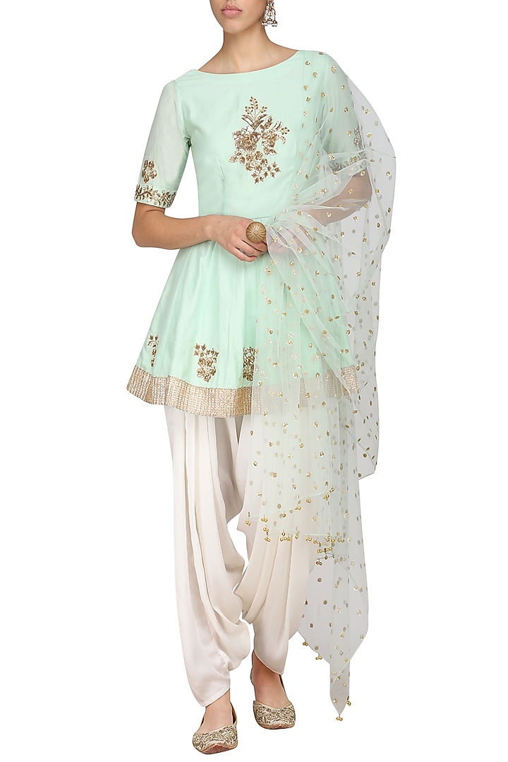 Mint green embroidered peplum kurta with ivory dhoti pants set available only at Pernia's Pop Up Shop.