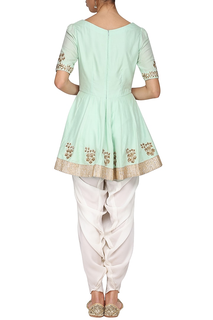 Mint green embroidered peplum kurta with ivory dhoti pants set available only at Pernia's Pop Up Shop.