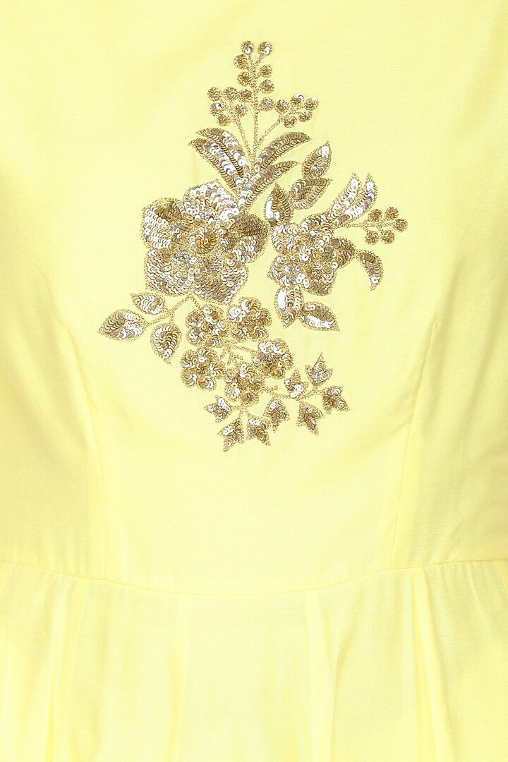Yellow embroidered peplum kurta with ivory dhoti pants set available only at Pernia's Pop Up Shop.