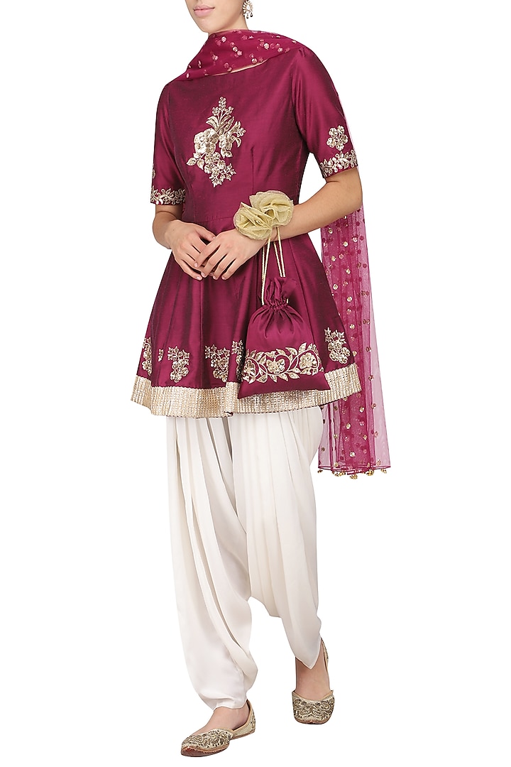 Wine embroidered peplum kurta with ivory dhoti pants set available only at Pernia's Pop Up Shop.