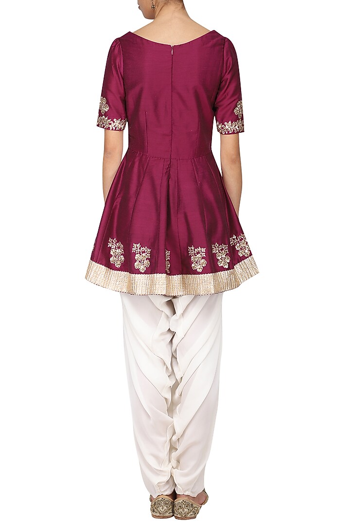 Wine embroidered peplum kurta with ivory dhoti pants set available only at Pernia's Pop Up Shop.