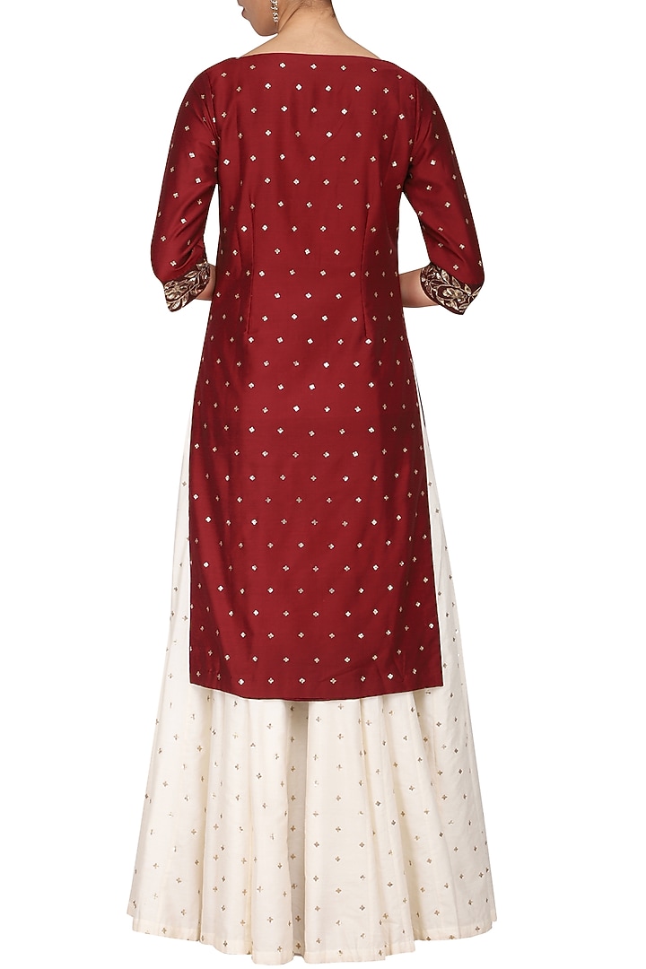 Wine embroidered kurta with ivory skirt set available only at Pernia's Pop Up Shop.
