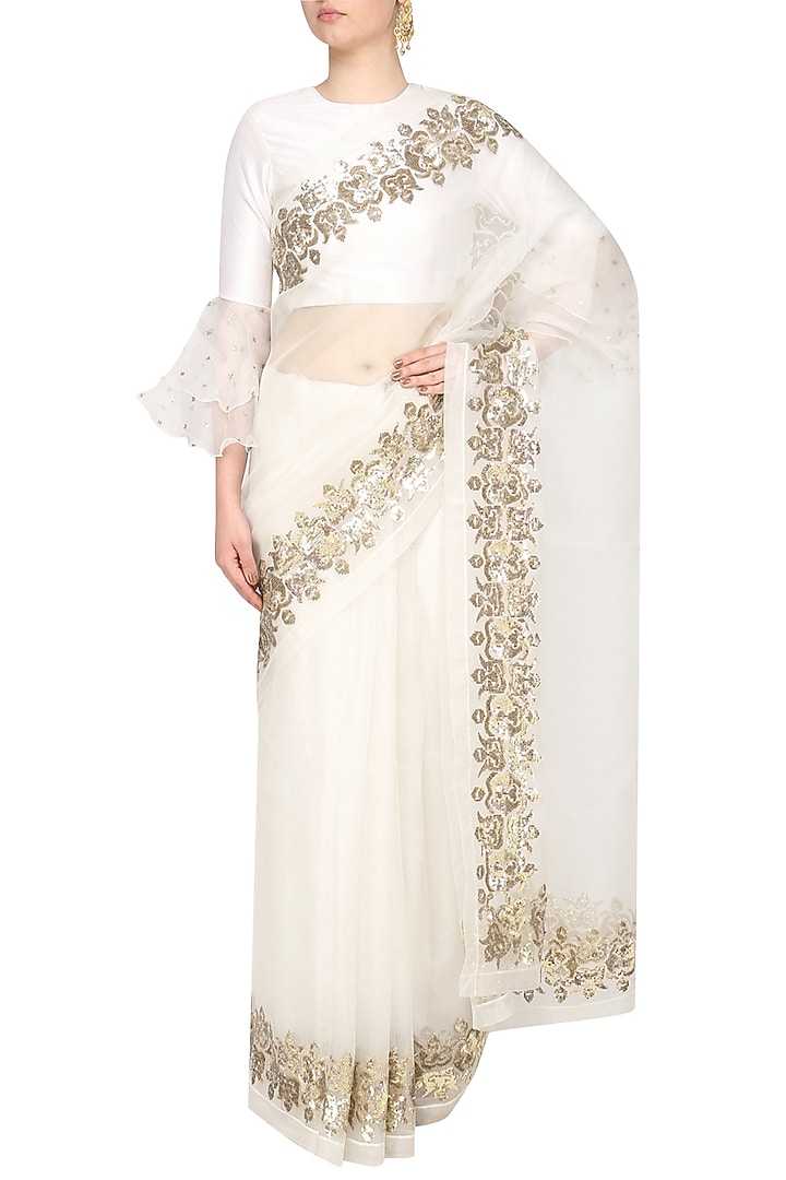 Ivory embroidered saree with blouse available only at Pernia's Pop Up Shop.