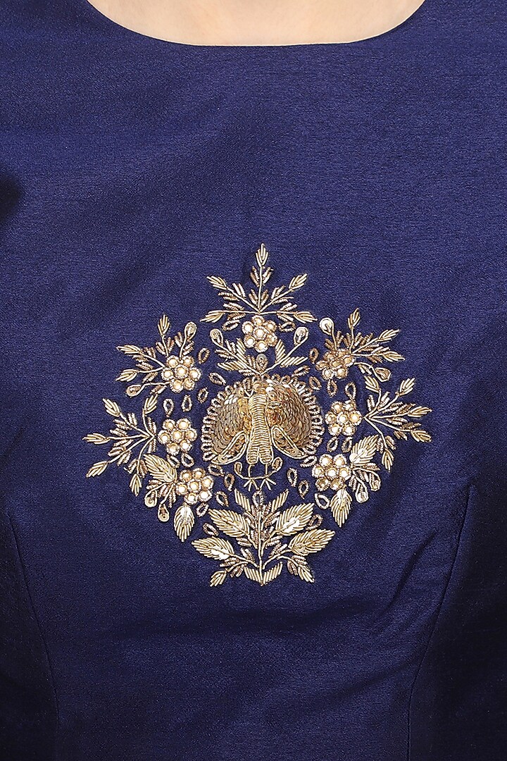 Blue embroidered crop top with lehenga skirt by Ranian at Pernia's Pop Up Shop