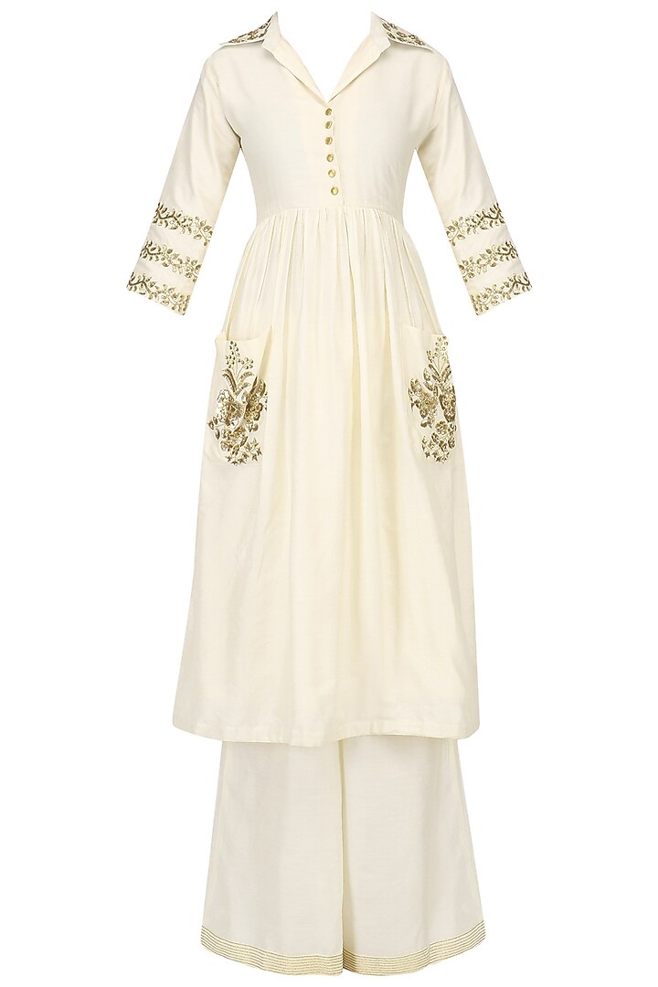 Ivory embroidered tunic with palazzo pants set available only at Pernia's Pop Up Shop.