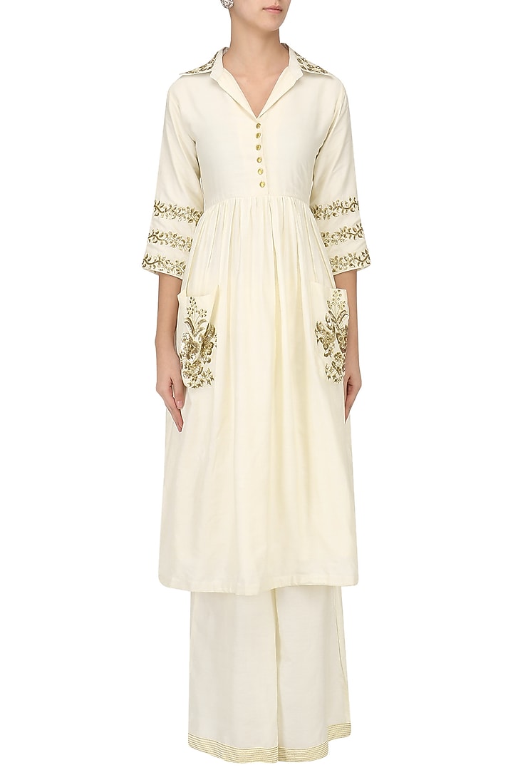 Ivory embroidered tunic with palazzo pants set available only at Pernia's Pop Up Shop.