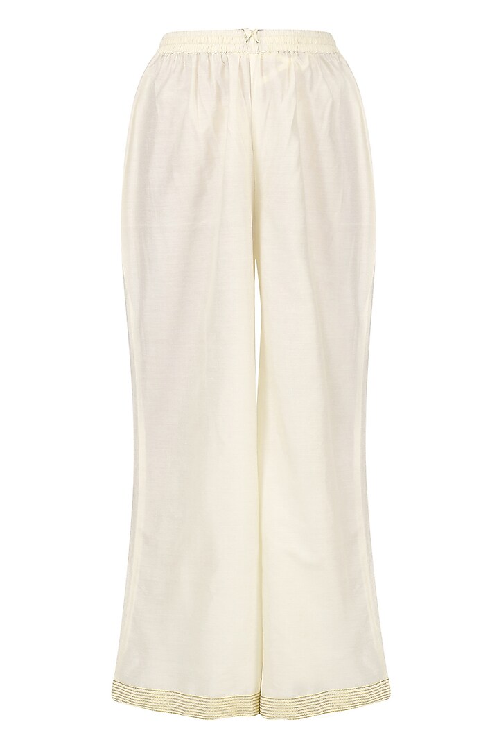Ivory embroidered tunic with palazzo pants set available only at Pernia's Pop Up Shop.