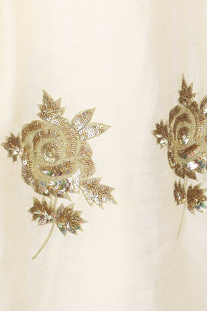 Ivory embroidered tunic with palazzo pants set available only at Pernia's Pop Up Shop.