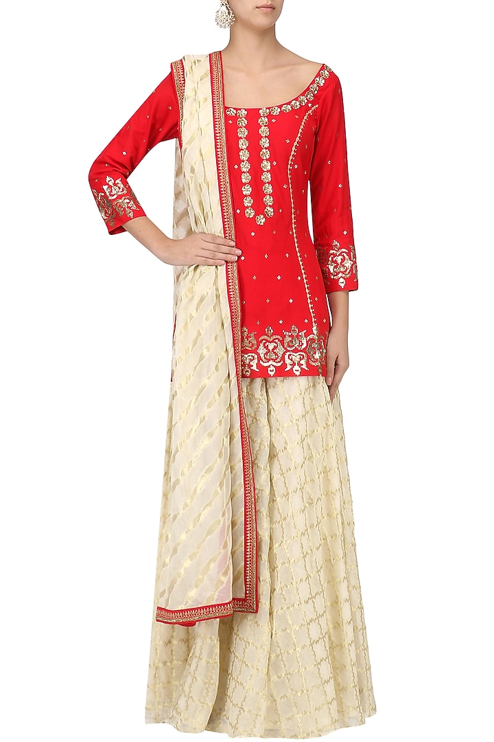 Crimson red embroidered short kurta with gharara set available only at Pernia's Pop Up Shop.