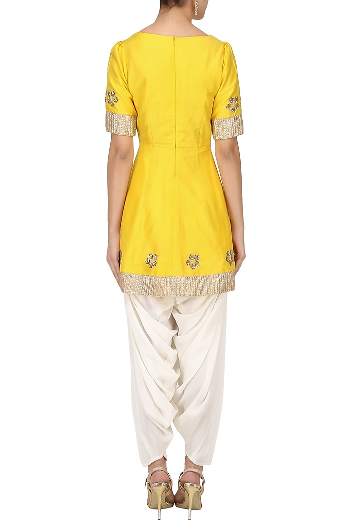 Sunflower yellow embroidered peplum kurta with dhoti salwar set available only at Pernia's Pop Up Shop.