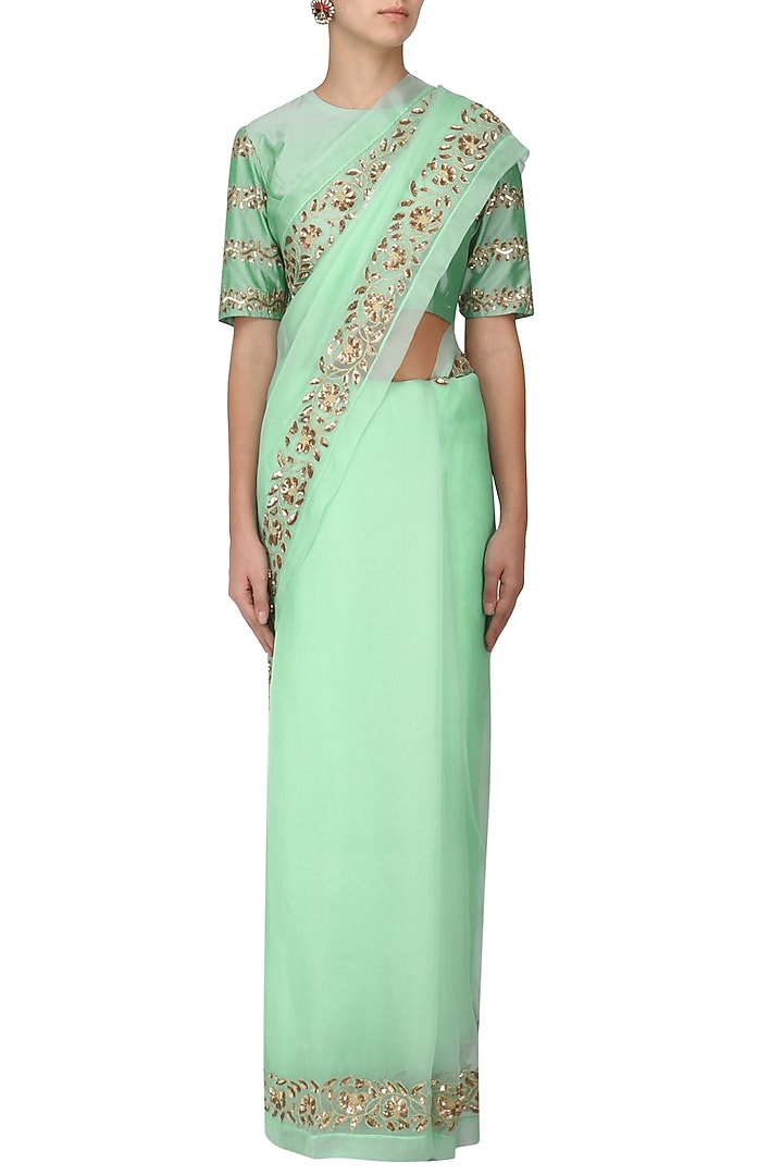 Mint green embroidered saree with blouse available only at Pernia's Pop Up Shop.