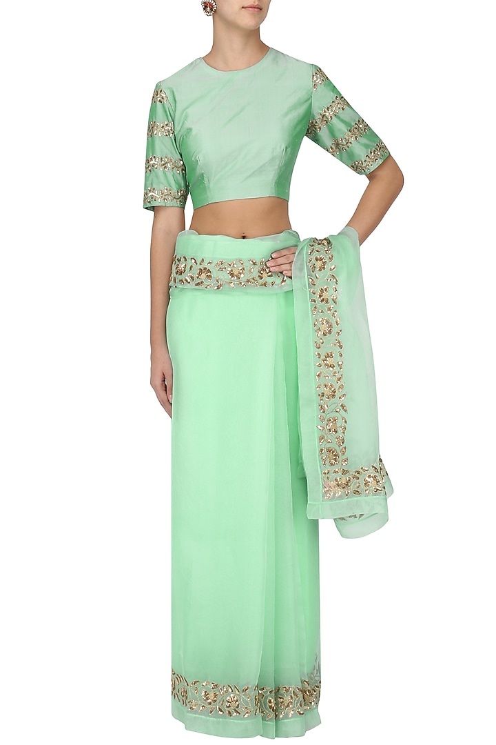 Mint green embroidered saree with blouse available only at Pernia's Pop Up Shop.