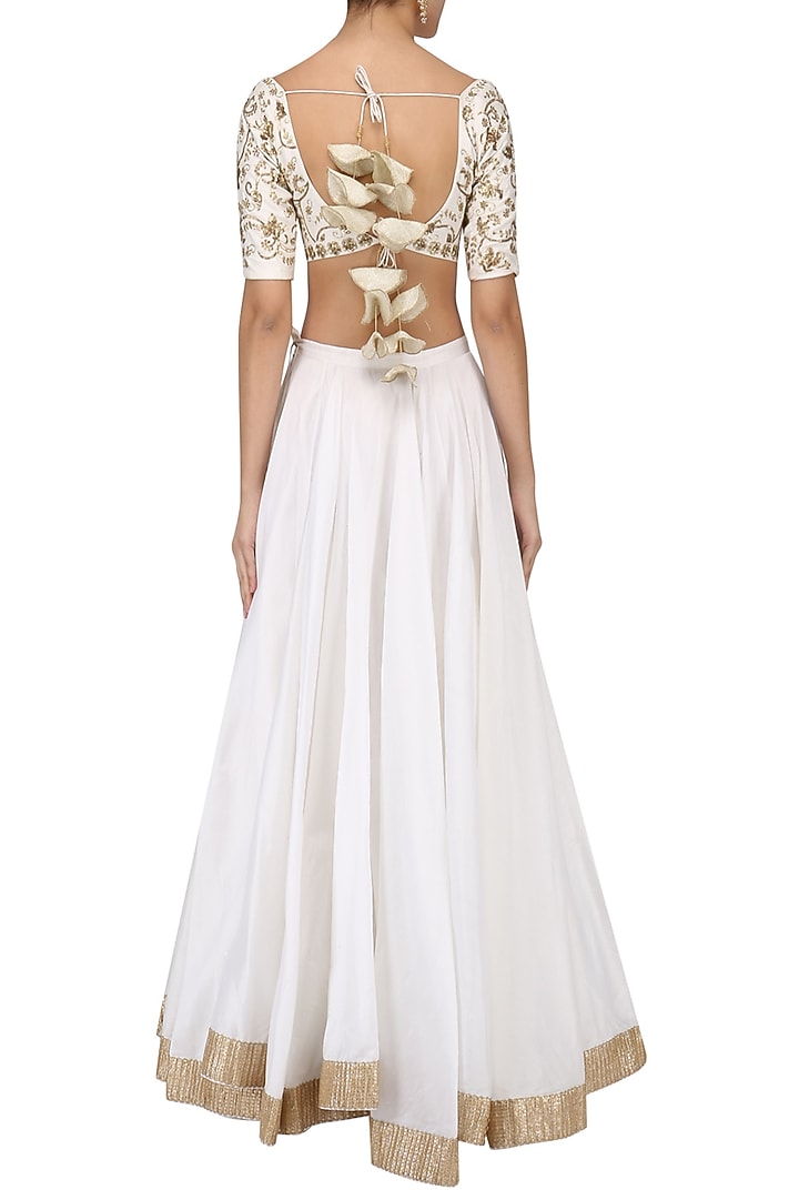 White embroidered lehenga set available only at Pernia's Pop Up Shop.