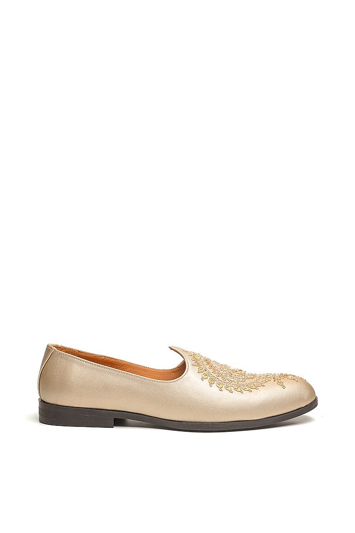 Light Gold Leather Embroidered Mojaris by NIDHI BHANDARI MEN at Pernia's Pop Up Shop