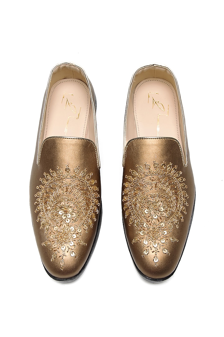 Antique Gold Faux Leather Embroidered Moccasin Shoes by NIDHI BHANDARI MEN