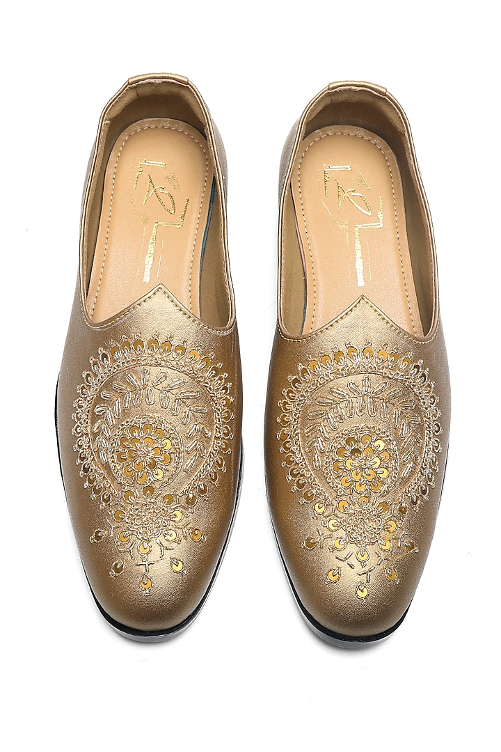 Antique Gold Nappa Leather Motif Embroidered Mojaris by NIDHI BHANDARI MEN at Pernia's Pop Up Shop