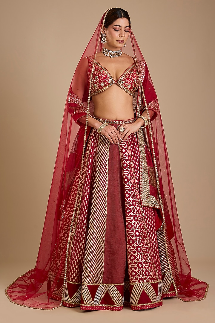 Ruby Red Silk Mirror Embroidered Bridal Lehenga Set by Neha khullar at Pernia's Pop Up Shop