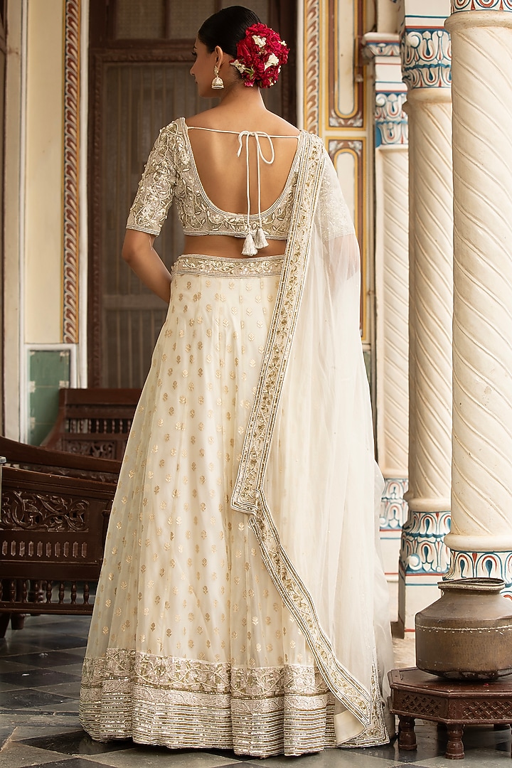 Ivory Banarasi Organza Wedding Lehenga Set by Neha khullar at Pernia's Pop Up Shop