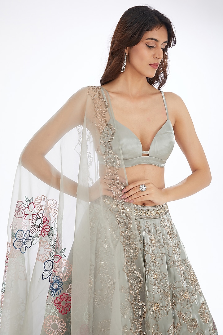 Green Satin Organza Hand Embroidered Bridal Lehenga Set by Neha & Tarun at Pernia's Pop Up Shop