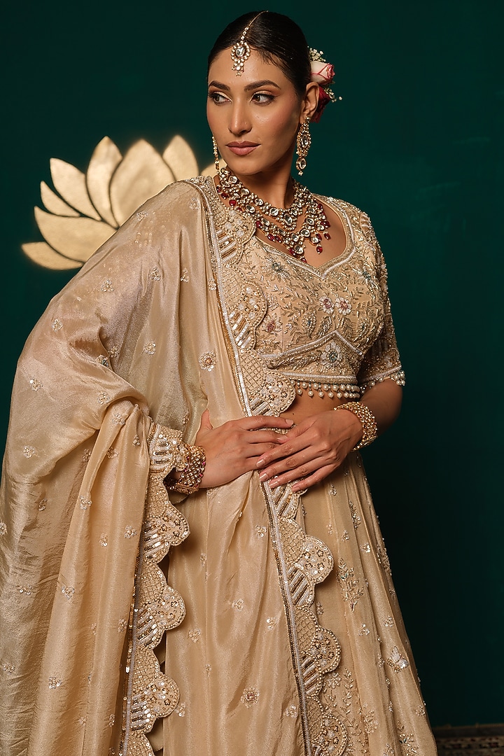Golden-Beige Shimmer Tissue Thread & Sequin Embroidered Bridal Lehenga Set by Niloufer by Aasif Ally at Pernia's Pop Up Shop