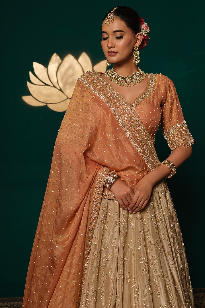 Cream Shimmer Tissue Floral & Cutdana Embroidered Bridal Lehenga Set by Niloufer by Aasif Ally at Pernia's Pop Up Shop