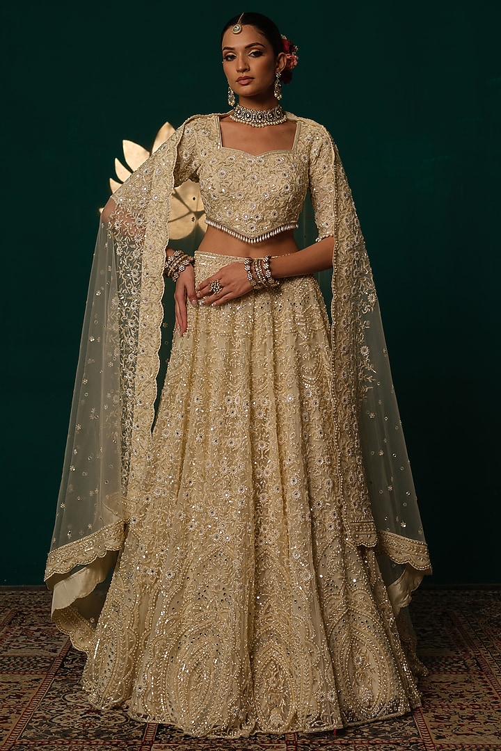 Cream Net Floral & Cutdana Hand Embroidered Bridal Lehenga Set by Niloufer by Aasif Ally at Pernia's Pop Up Shop