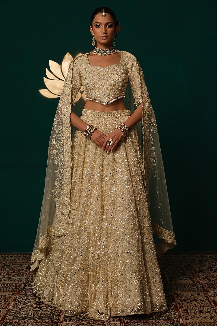 Cream Net Floral & Cutdana Hand Embroidered Bridal Lehenga Set by Niloufer by Aasif Ally at Pernia's Pop Up Shop