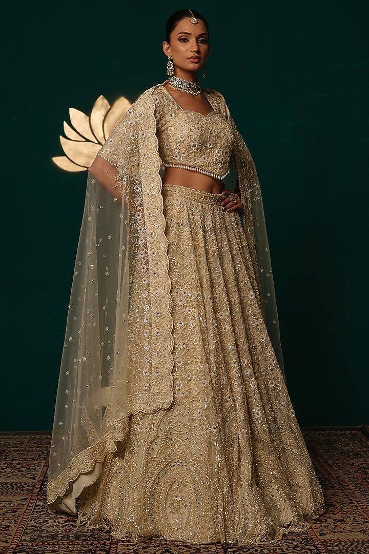 Cream Net Floral & Cutdana Hand Embroidered Bridal Lehenga Set by Niloufer by Aasif Ally at Pernia's Pop Up Shop